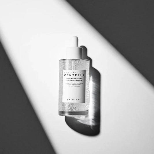 SKIN1004 Brightening Ampoule for even skin tone and radiance, packed with Centella. Available at LE AURA in Kuwait.